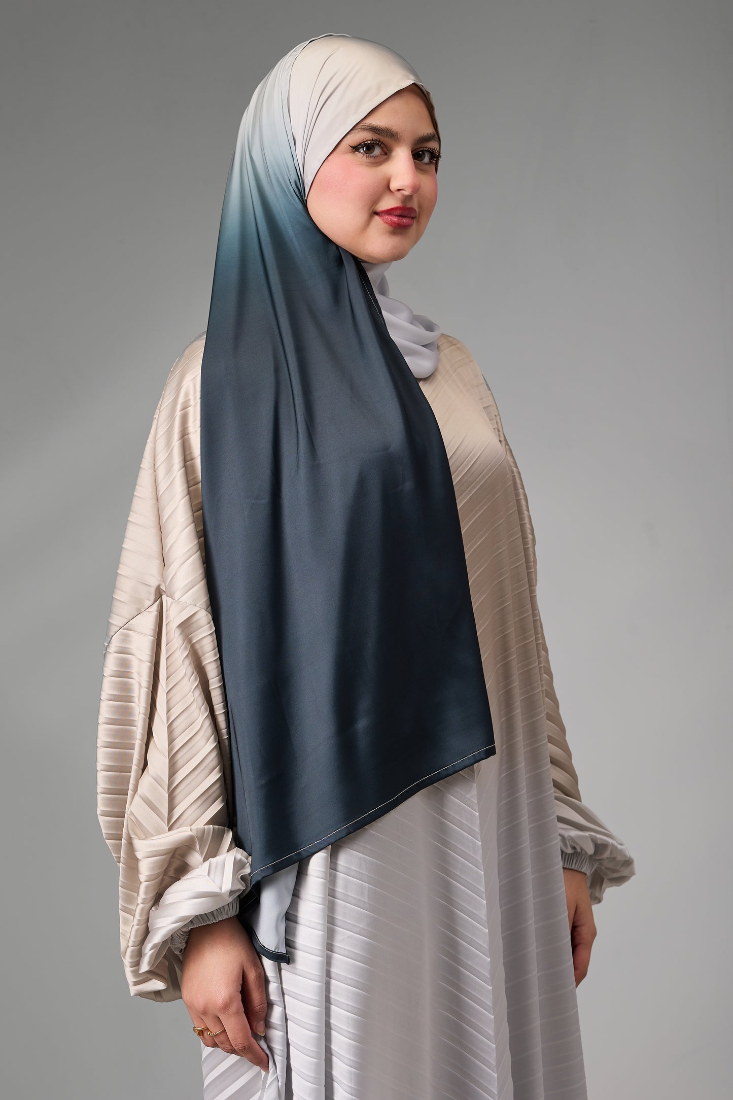 Beige to Deep Teal pleated satin